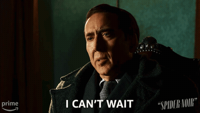 A Man In A Suit And Tie Says " I Can 'T Wait " While Sitting In A Chair GIF