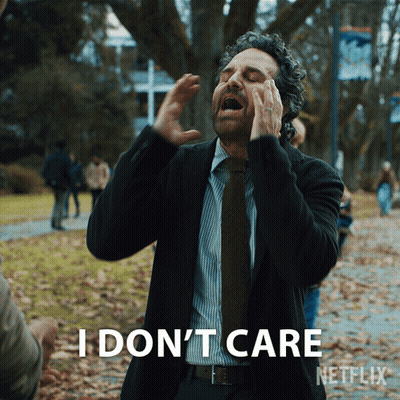 A Man In A Suit And Tie Says I Do N't Care Netflix GIF
