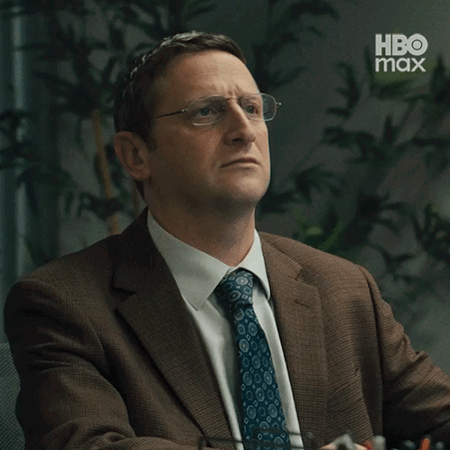 A Man In A Suit And Tie Says I Don T Know GIF