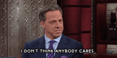 A Man In A Suit And Tie Says " I Don T Think Anybody Cares " GIF
