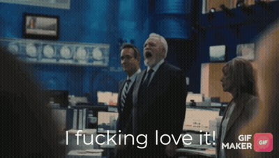 A Man In A Suit And Tie Says " I Fucking Love It " GIF