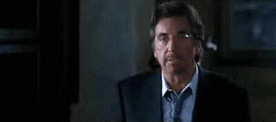 A Man In A Suit And Tie Says " I 'M Gamblin ' Again " GIF