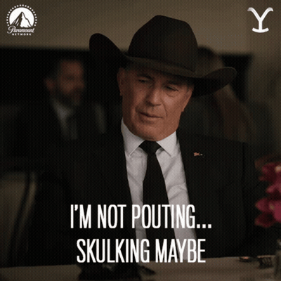 A Man In A Suit And Tie Says I 'M Not Pouting ... Skullking Maybe GIF