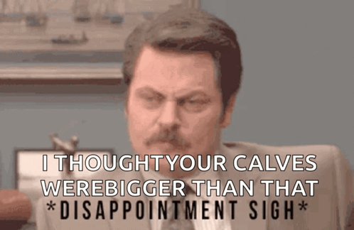 A Man In A Suit And Tie Says I Thought Your Calves Were Bigger Than That Disappointment Sigh * GIF