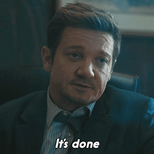 A Man In A Suit And Tie Says " It 'S Done " While Sitting In A Chair GIF