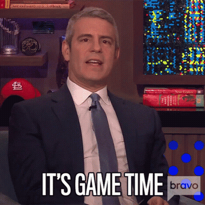 A Man In A Suit And Tie Says It 'S Game Time On Bravo GIF