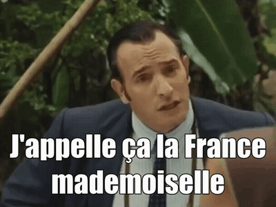 A Man In A Suit And Tie Says J'appelle Ca La France GIF
