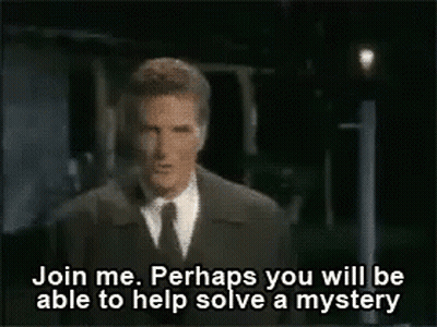 A Man In A Suit And Tie Says Join Me Perhaps You Will Be Able To Solve A Mystery GIF