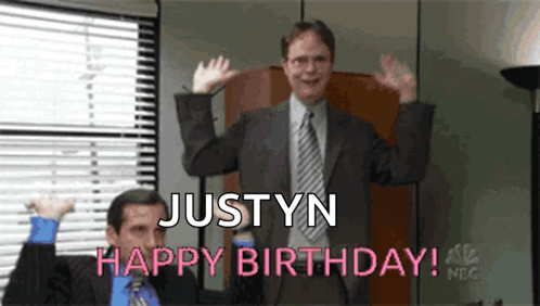 A Man In A Suit And Tie Says Justyn Happy Birthday To Another Man GIF