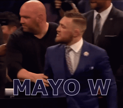 A Man In A Suit And Tie Says Mayo W On The Screen GIF