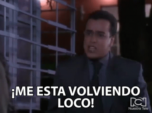 A Man In A Suit And Tie Says Me Esta Volviendo Loco GIF