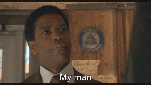 A Man In A Suit And Tie Says My Man GIF