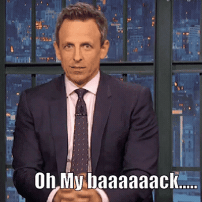 A Man In A Suit And Tie Says Oh My Baaaack GIF
