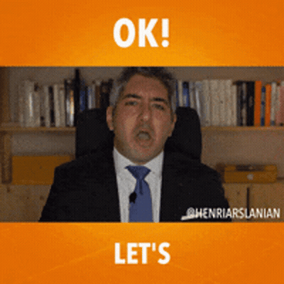 A Man In A Suit And Tie Says " Ok " And " Let 'S " GIF
