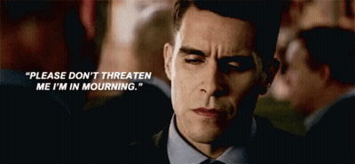 A Man In A Suit And Tie Says " Please Don 'T Threaten Me I 'M In Mourning . " GIF