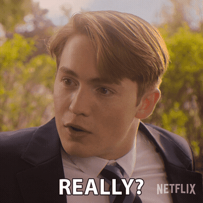 A Man In A Suit And Tie Says Really On A Netflix Ad GIF
