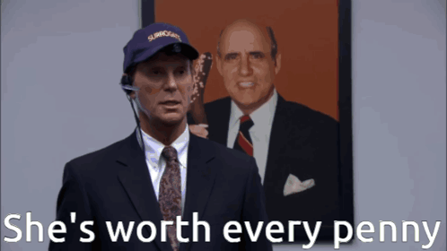 A Man In A Suit And Tie Says She 'S Worth Every Penny In Front Of A Picture Of Two Men GIF