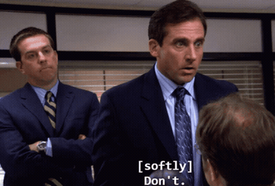 A Man In A Suit And Tie Says Softly Don T GIF