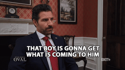 A Man In A Suit And Tie Says That Boy Is Gonna Get What 'S Coming To Him GIF