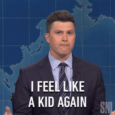 A Man In A Suit And Tie Says That He Feels Like A Kid Again GIF