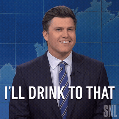 A Man In A Suit And Tie Says That He 'Ll Drink To That GIF
