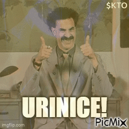 A Man In A Suit And Tie Says Urinice On A Picture GIF