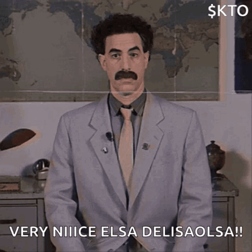 A Man In A Suit And Tie Says Very Nice Elsa Delisaolsa GIF
