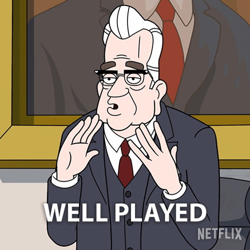 A Man In A Suit And Tie Says Well Played In Front Of A Painting GIF