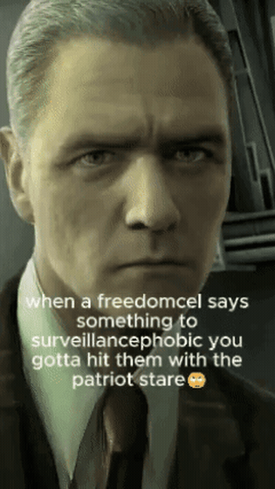 A Man In A Suit And Tie Says When A Freedomcel Says Something To Surveillancephobic GIF
