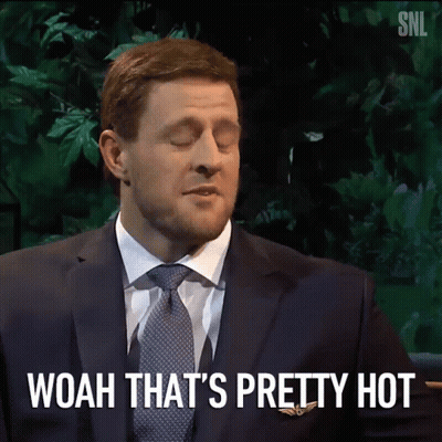 A Man In A Suit And Tie Says Woah That Is Pretty Hot GIF