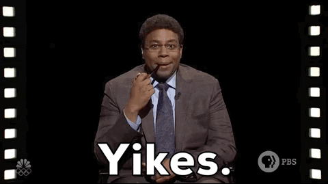 A Man In A Suit And Tie Says Yikes GIF