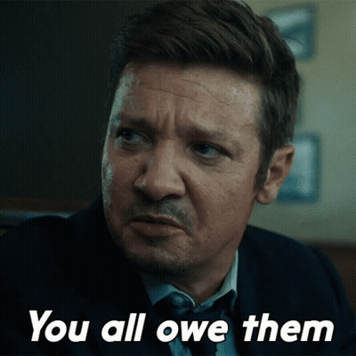 A Man In A Suit And Tie Says " You All Owe Them " In White Letters GIF