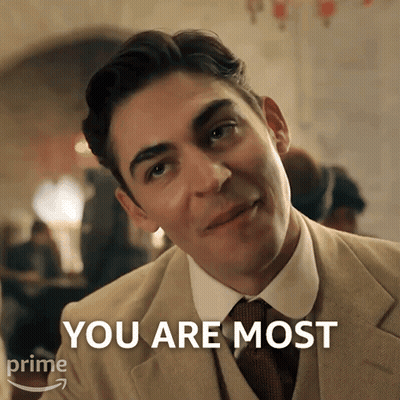 A Man In A Suit And Tie Says " You Are Most " In Front Of Him GIF