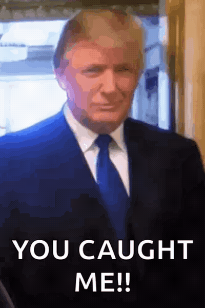 A Man In A Suit And Tie Says You Caught Me ! GIF