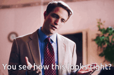 A Man In A Suit And Tie Says " You See How This Looks Right ? " GIF