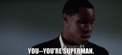 A Man In A Suit And Tie Says You You 'Re Superman . GIF