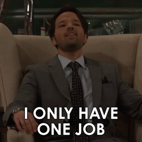 A Man In A Suit And Tie Sits In A Chair And Says " I Only Have One Job " GIF