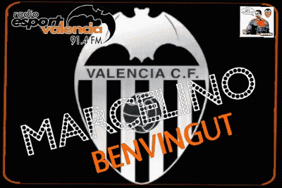 A Man In A Suit And Tie Sits In A Chair With The Name Marcelino Benvingut Written On It GIF