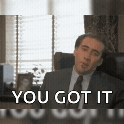 A Man In A Suit And Tie Smoking A Cigarette With The Words You Got It Behind Him GIF