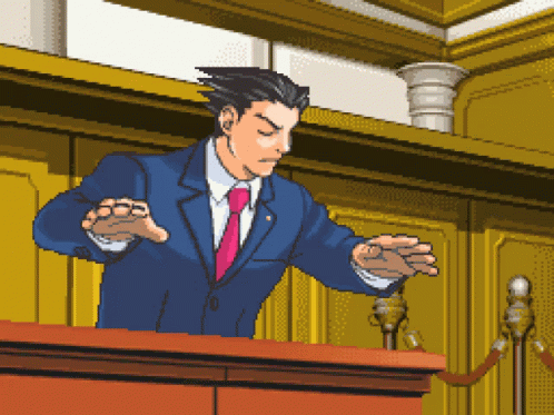 A Man In A Suit And Tie Stands At A Podium In A Courtroom GIF