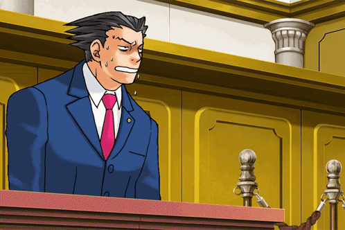 A Man In A Suit And Tie Stands At A Podium With His Mouth Open GIF