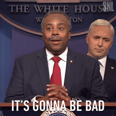 A Man In A Suit And Tie Stands At A Podium With The Words " It 'S Gonna Be Bad " Above Him GIF