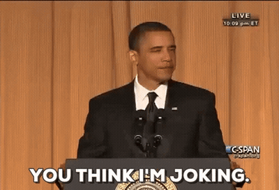 A Man In A Suit And Tie Stands At A Podium With The Words You Think I 'M Joking Behind Him GIF