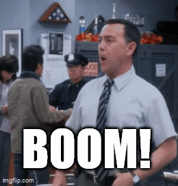 A Man In A Suit And Tie Stands In Front Of A Group Of Police Officers And Says Boom GIF