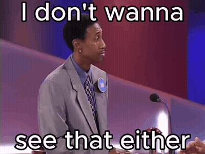 A Man In A Suit And Tie Stands In Front Of A Microphone With The Words I Don T Wanna See That Either Below Him GIF