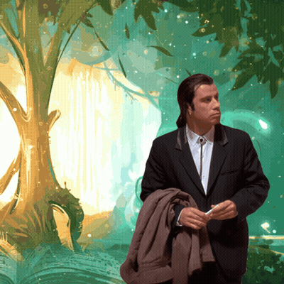 A Man In A Suit And Tie Stands In Front Of A Waterfall GIF