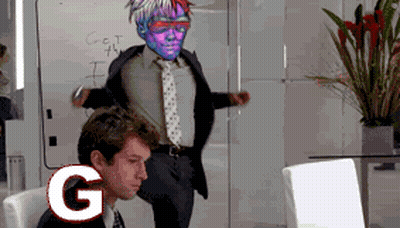 A Man In A Suit And Tie Stands In Front Of A White Board That Says Get The I On It GIF