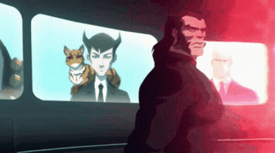 A Man In A Suit And Tie Stands In Front Of A Window With A Cat On His Shoulder GIF