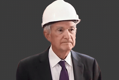 A Man In A Suit And Tie Wears A Hard Hat GIF