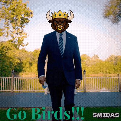 A Man In A Suit And Tie With A Bull 'S Head And The Words Go Birds GIF